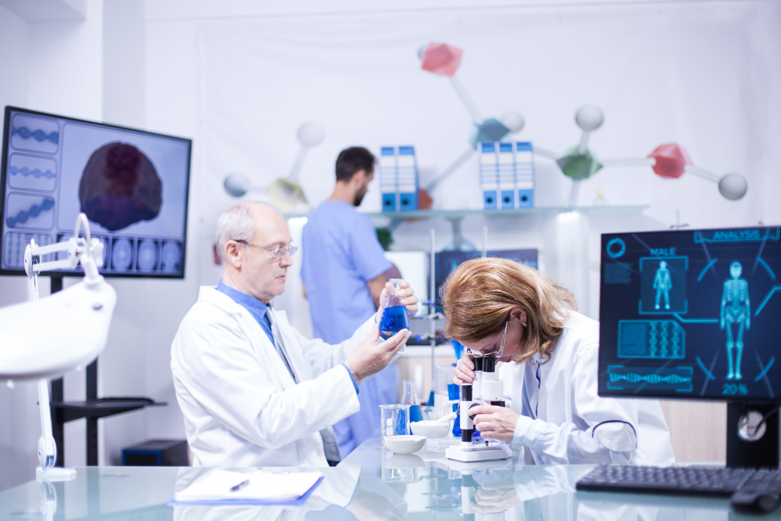 Researchers working in a modern Canadian university laboratory