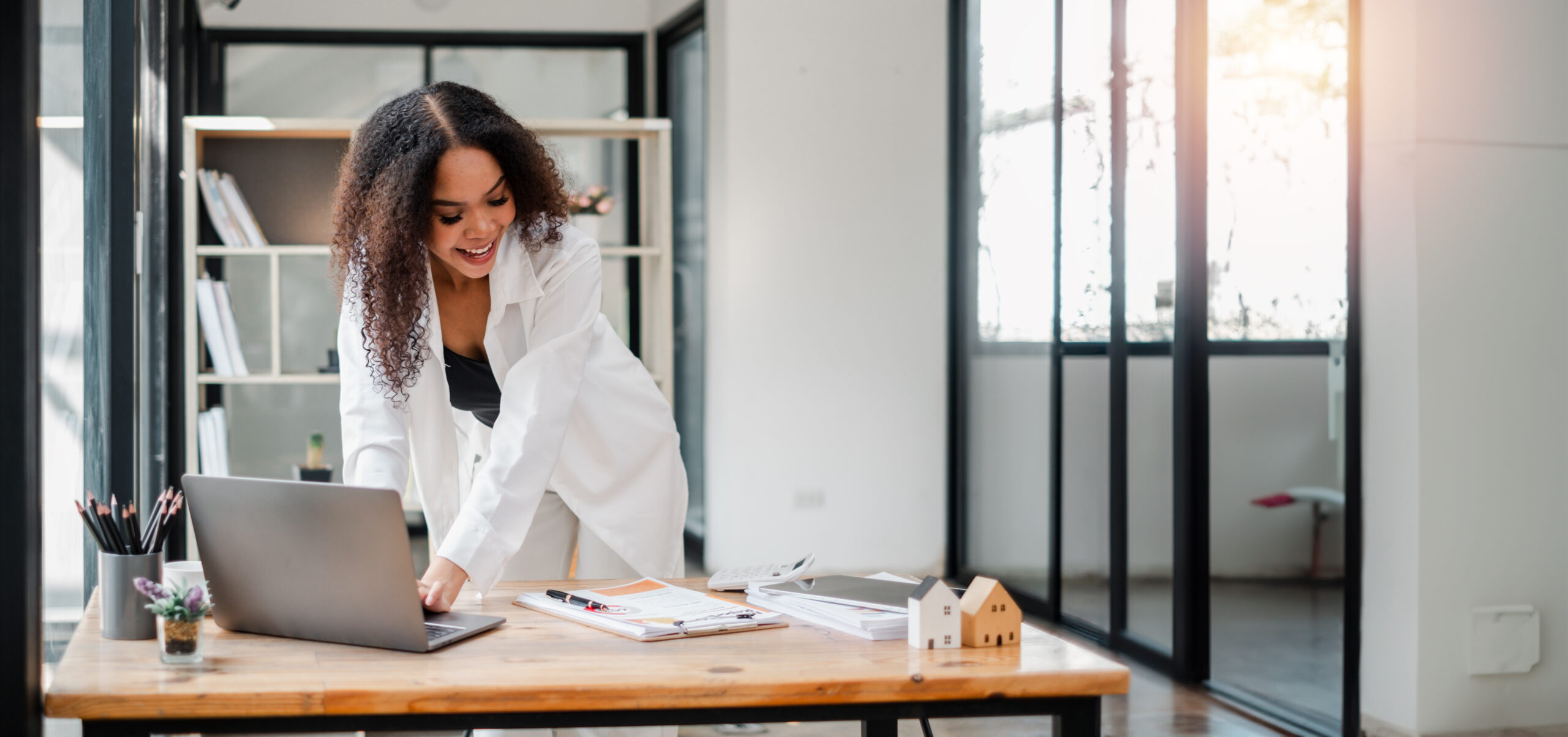 Professional working confidently  UK Skilled Worker visa from Pakistan