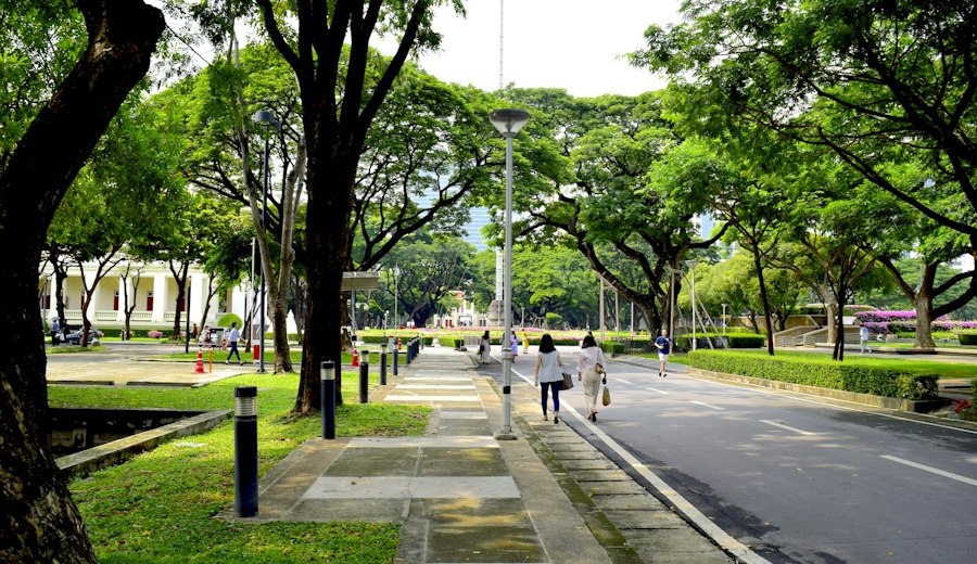 Students walking on a university campus in Bangkok, Thailand