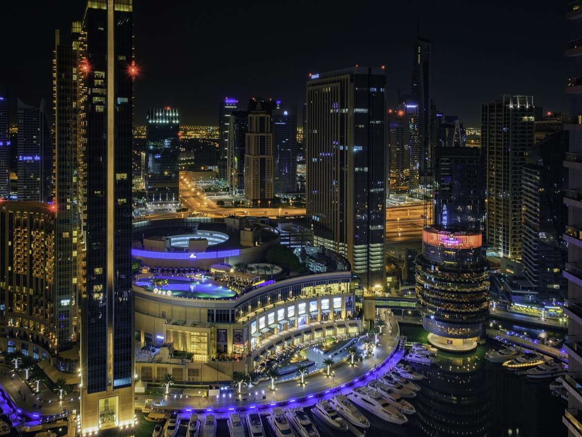 Dubai Marina towers lit up at night