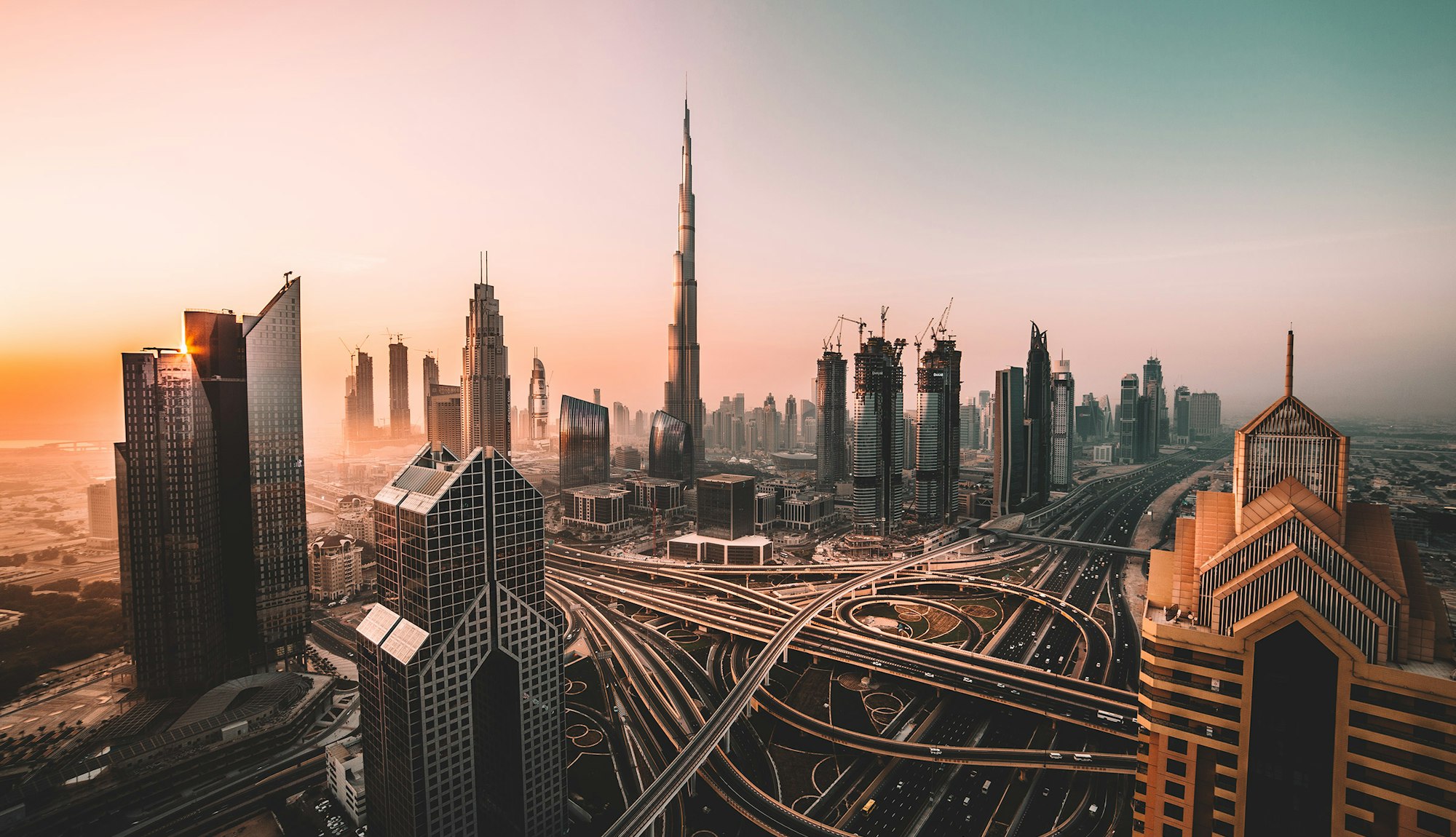 Burj Khalifa and the Dubai skyline at sunset