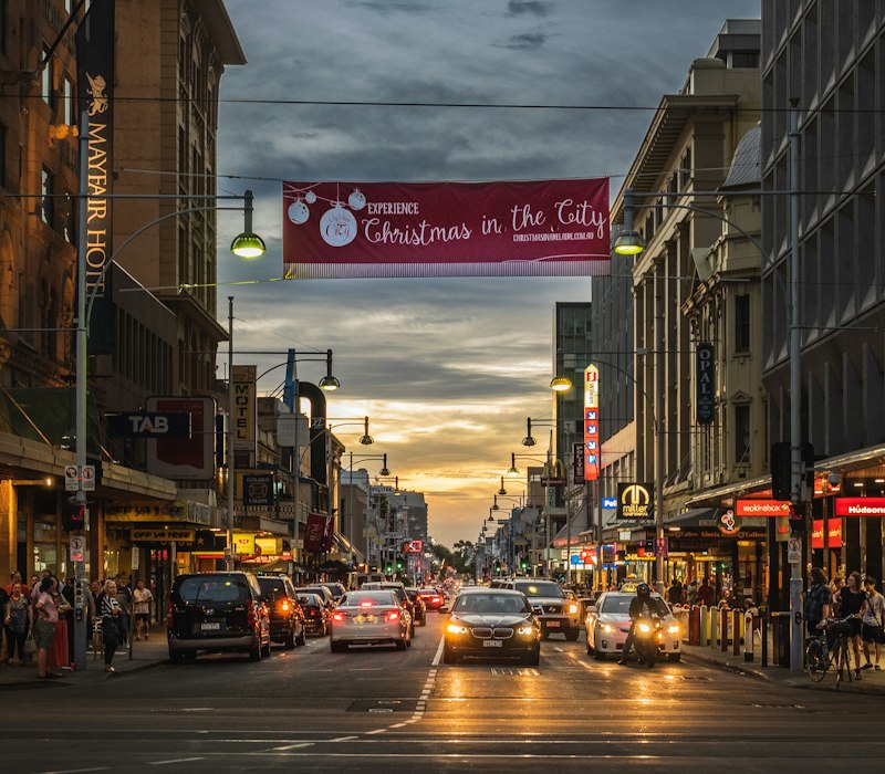 A lively Adelaide street at dusk