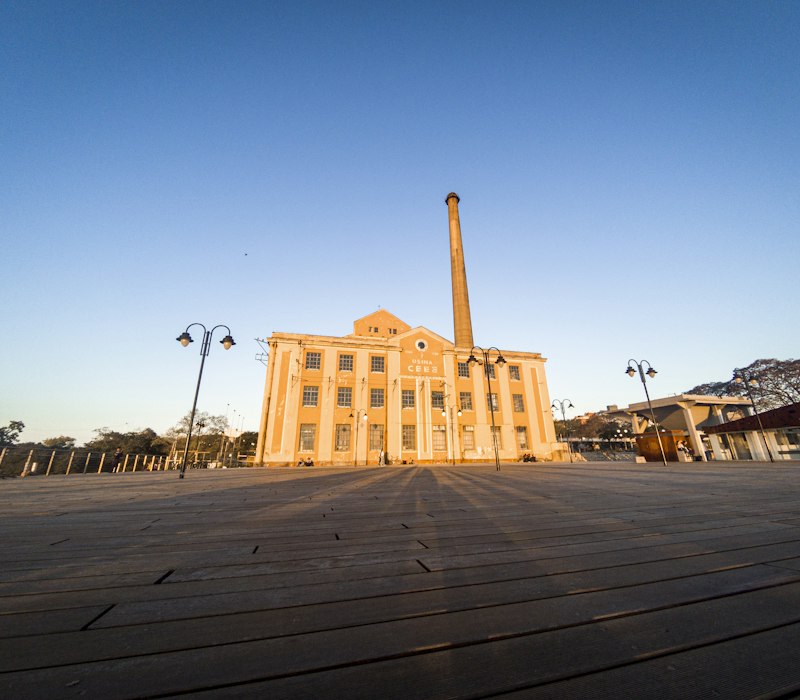 A historic riverside building in Porto Alegre at sunset