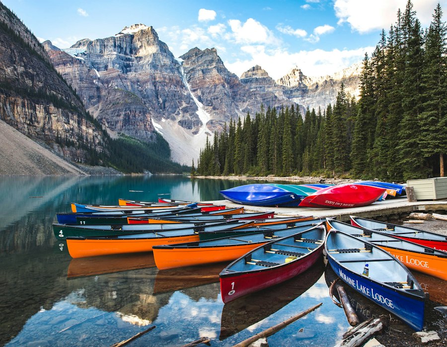 Colourful canoes on Moraine Lake in the Canadian Rockies
