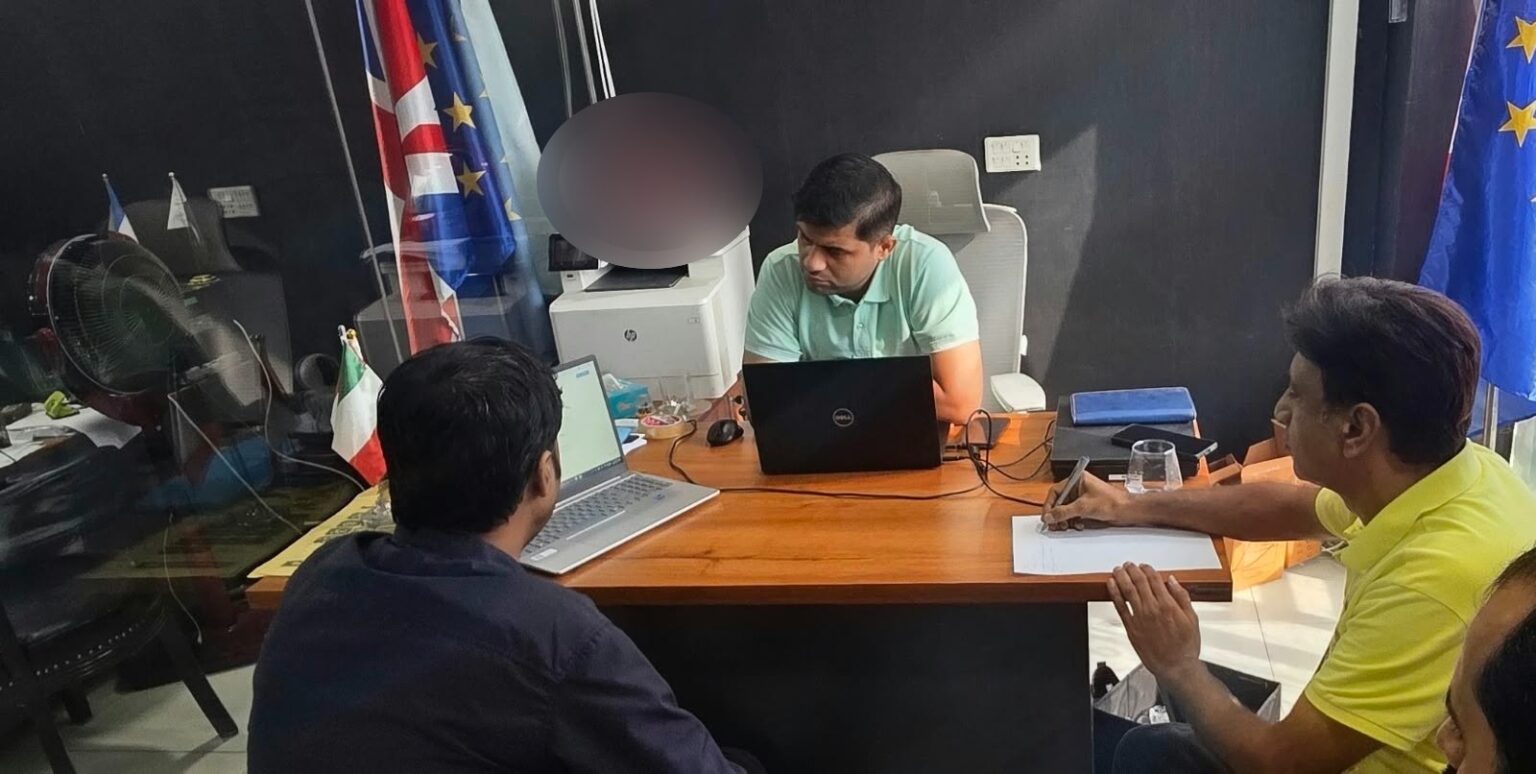 Our adviser in a counselling session with clients at the Westside office in DHA Lahore, with Mujtaba Maharvi taking notes