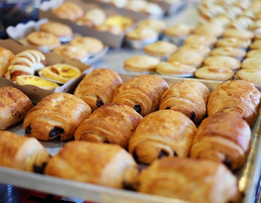 A tray of fresh French pastries in a bakery