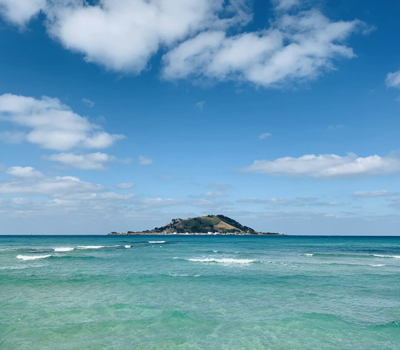 Turquoise sea and an island off the coast of Jeju
