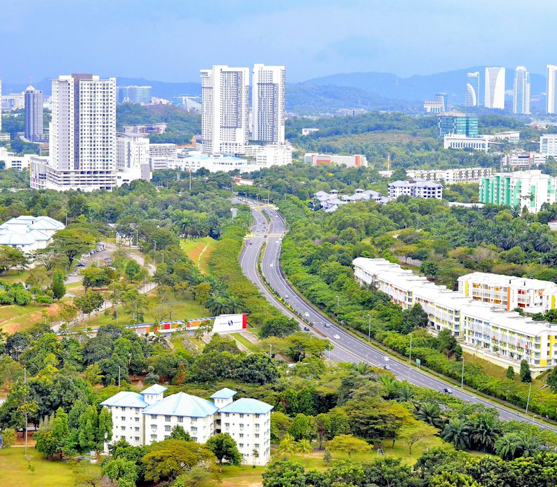 Green parks and modern buildings in Cyberjaya