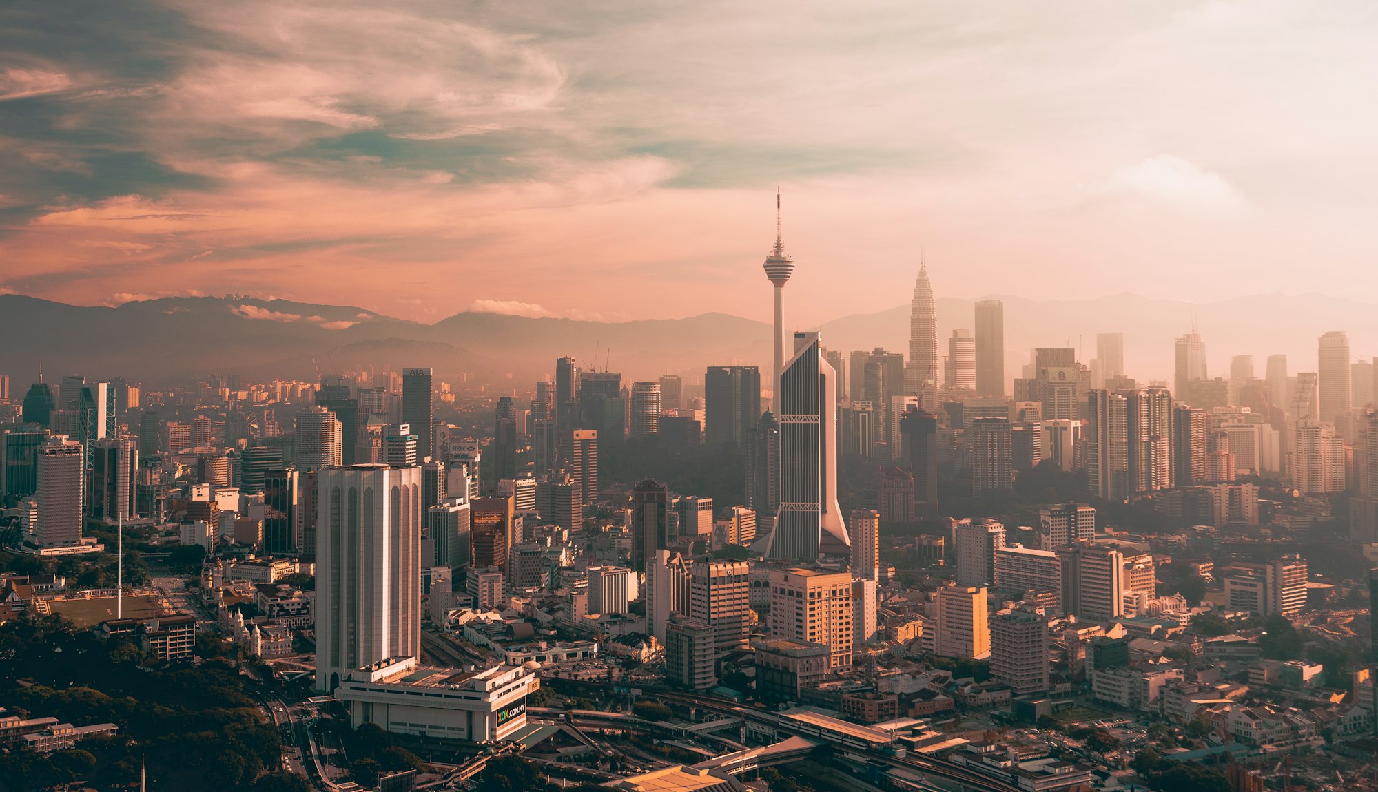 The Kuala Lumpur skyline glowing at sunset