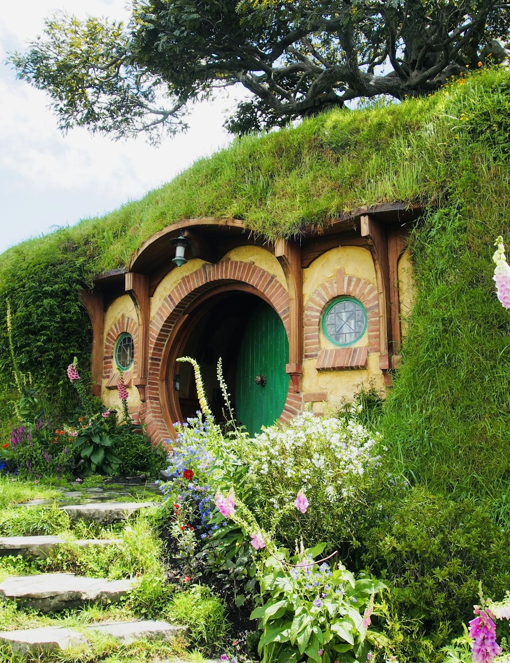 A round green hobbit hole door at Hobbiton