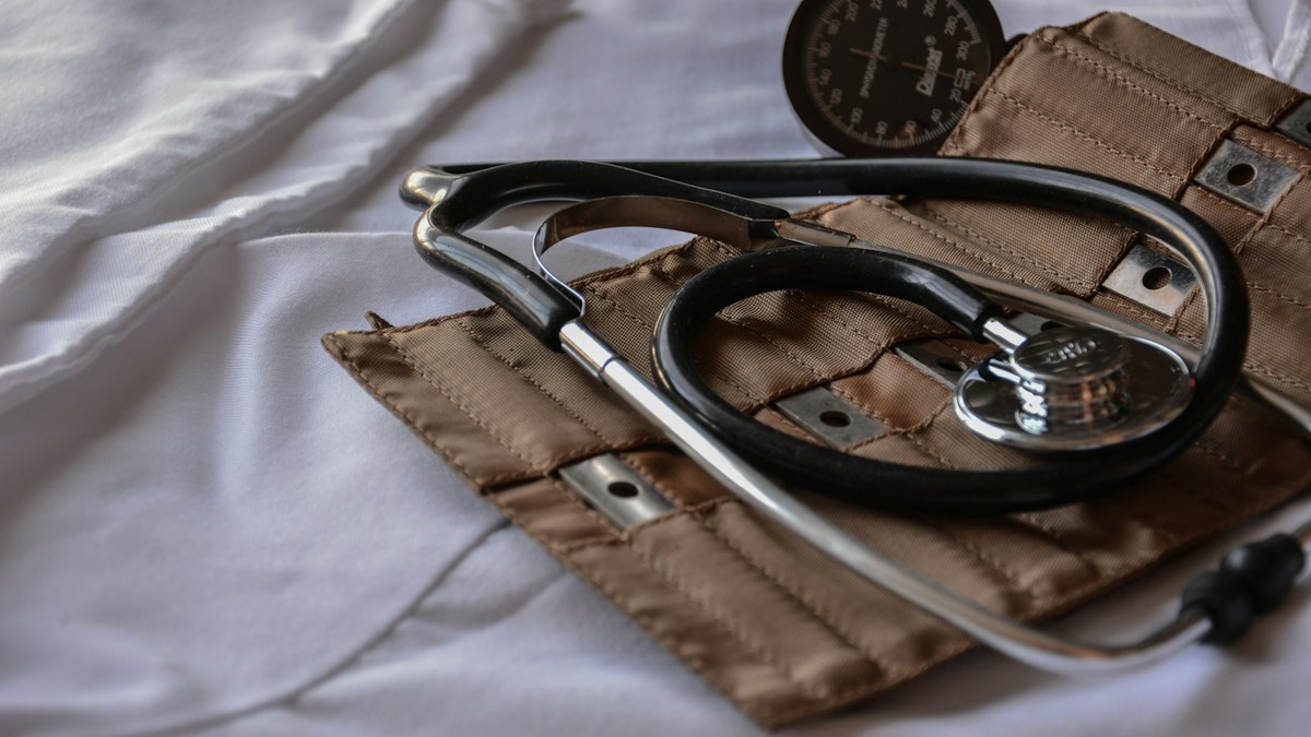 A stethoscope on a medical file
