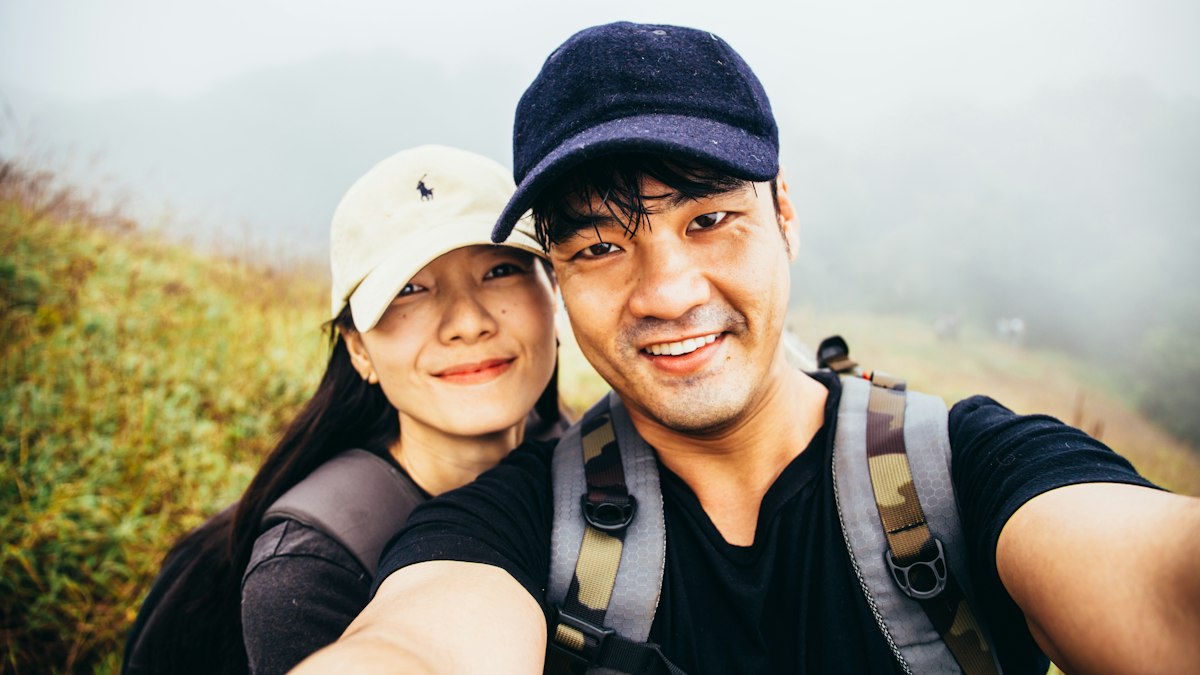 A couple taking a selfie while travelling
