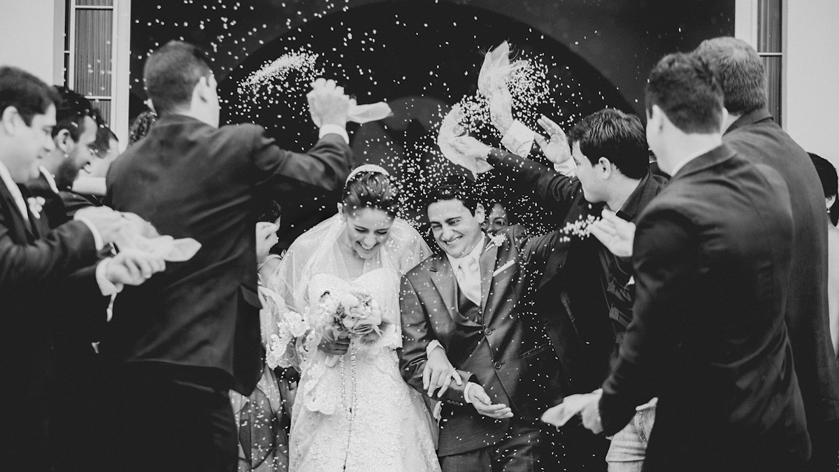 Wedding photographs spread out on a table