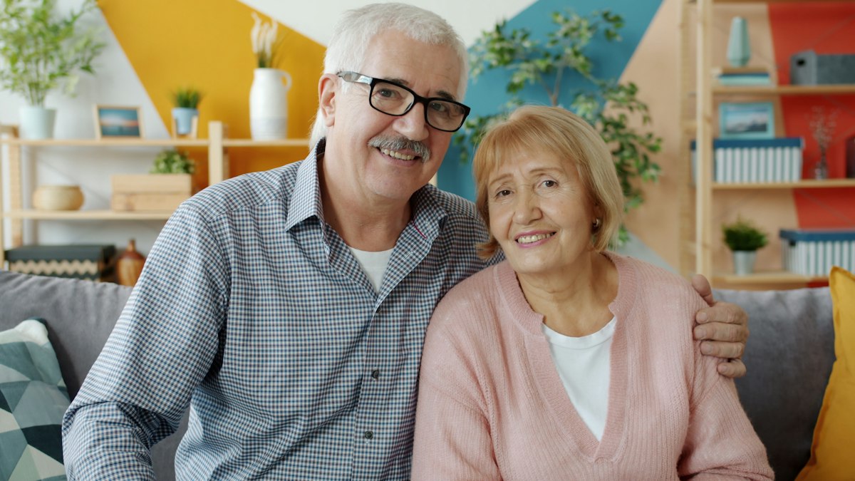 An older couple smiling together