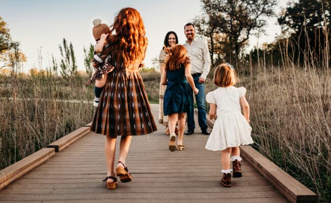 A family walking together through a field