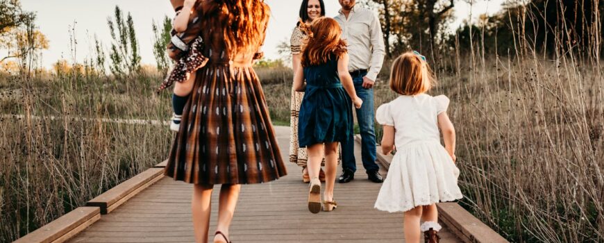 A family walking together through a field