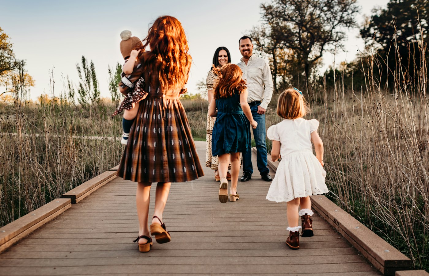 A family walking together through a field
