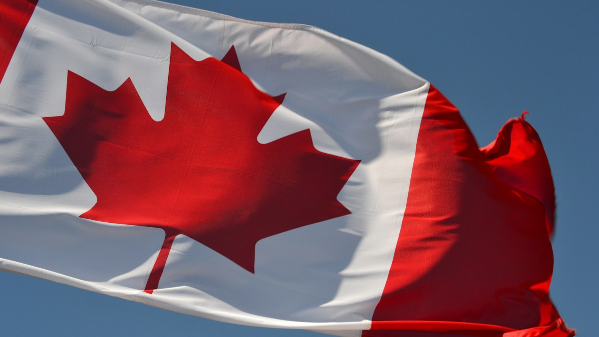 The Canadian flag waving