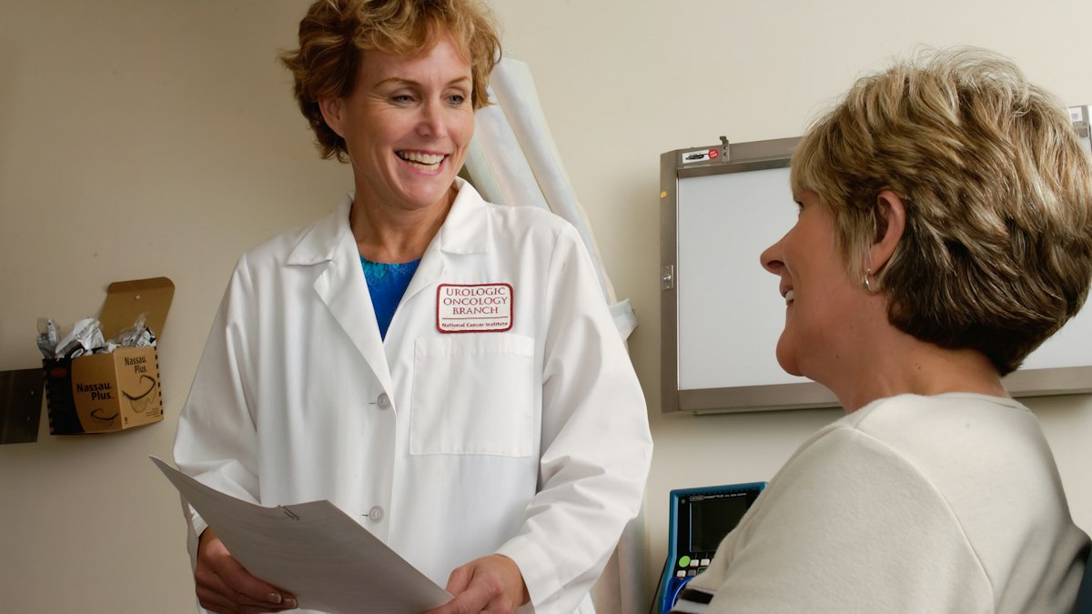 A doctor talking with a patient