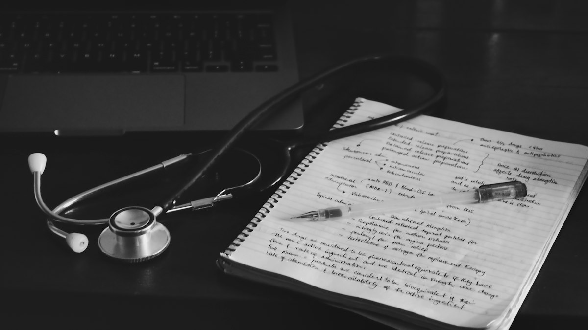 A stethoscope on medical paperwork