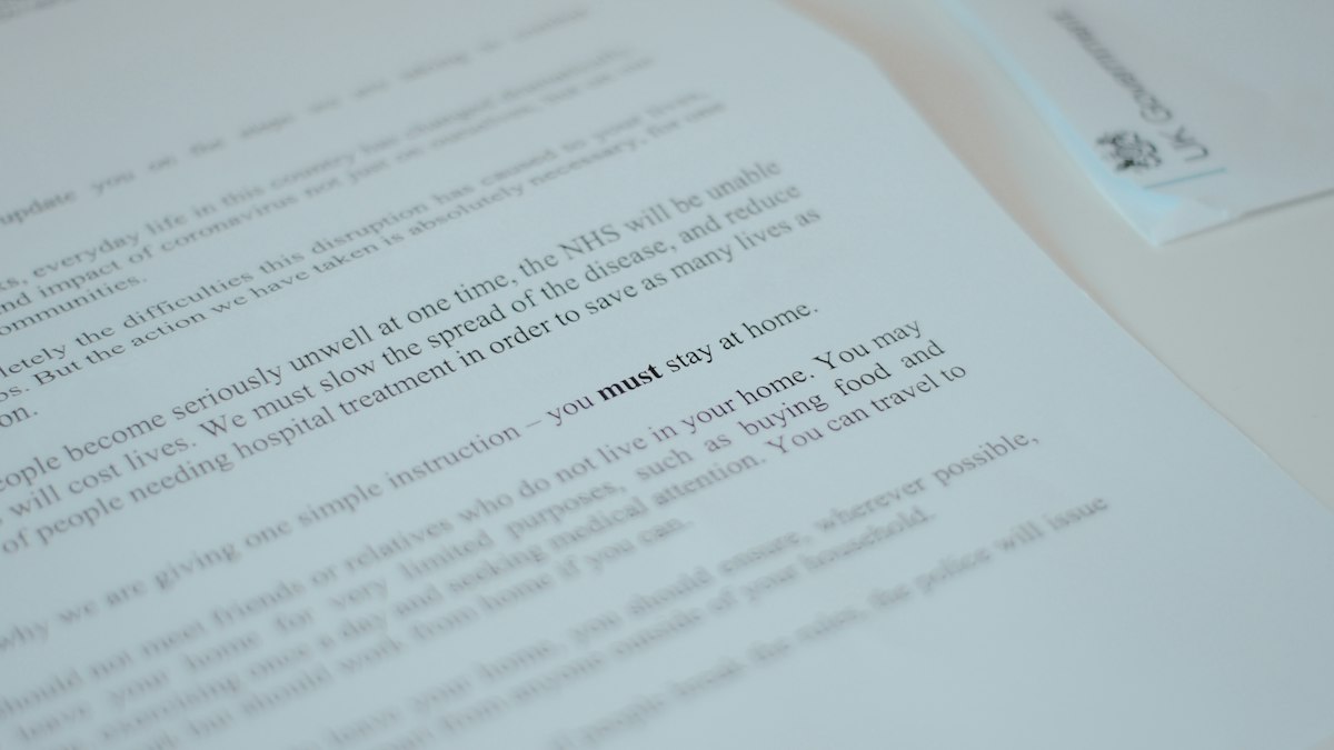 A university offer letter on a desk