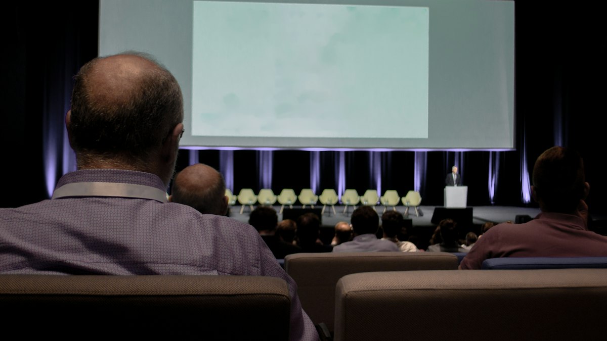 A speaker at a business conference