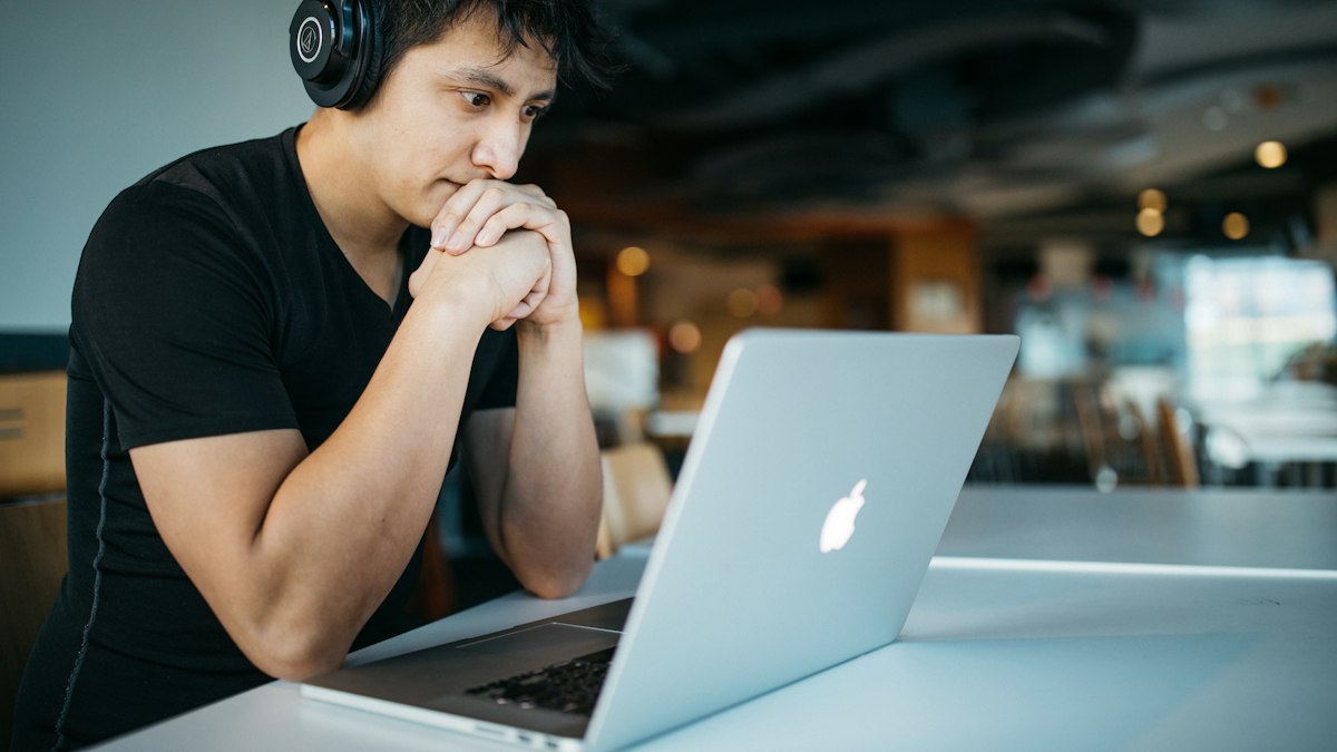 A student studying on a laptop