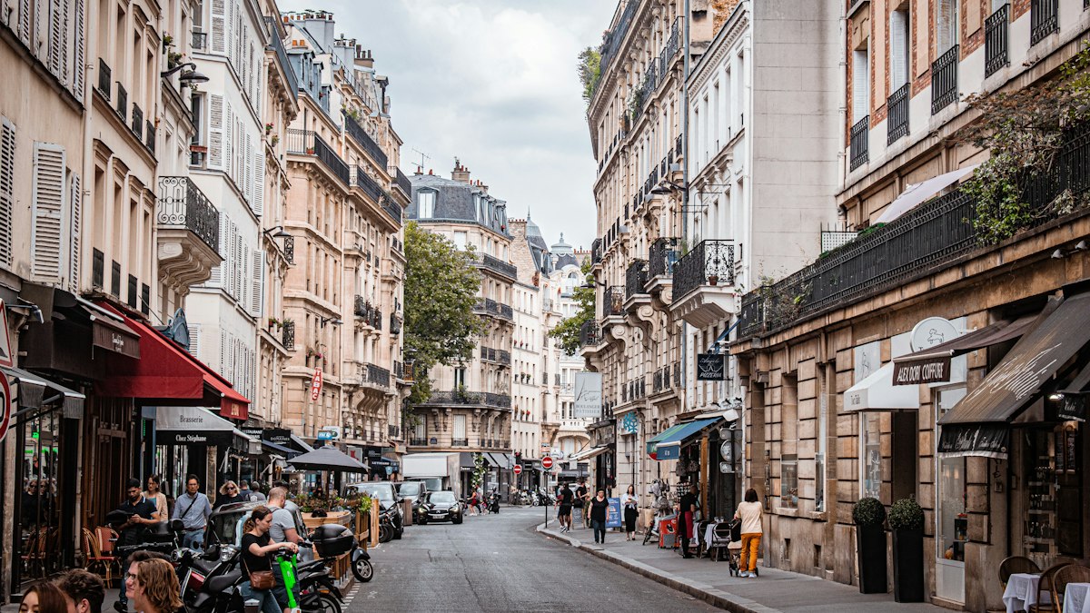 A busy Paris street with shops
