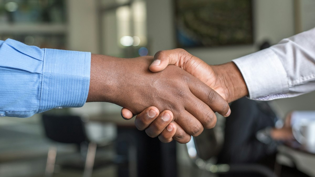 A handshake at the end of a meeting