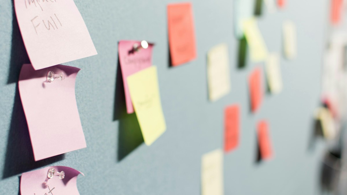 Colourful sticky notes on a planning wall