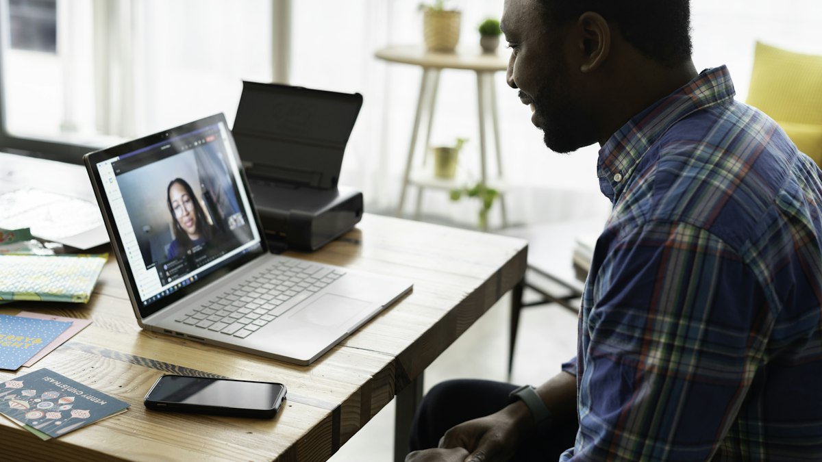 A video call interview on a laptop