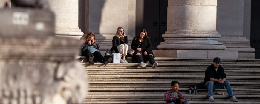 Students sitting on university steps