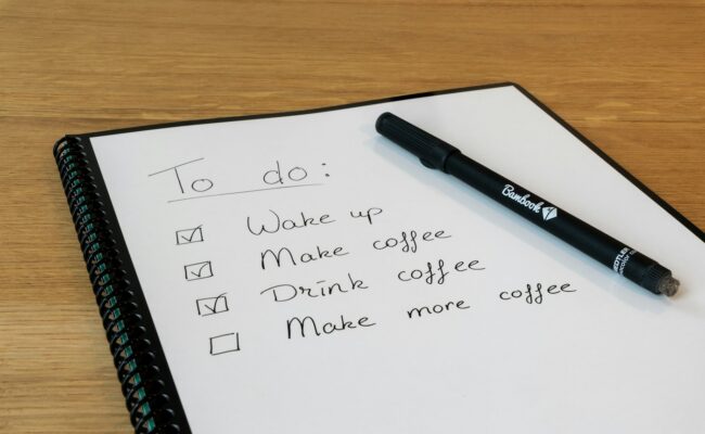 A handwritten checklist on a desk