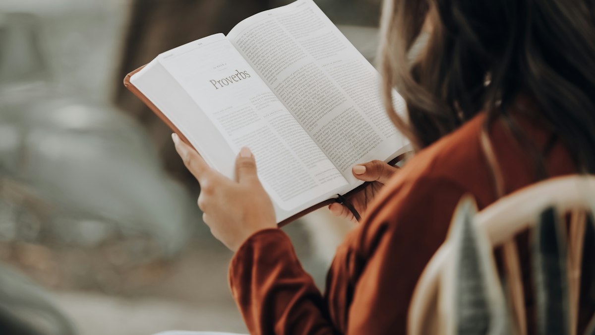 A student reading a textbook