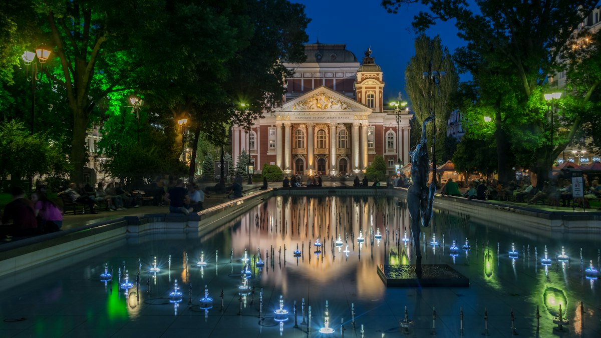 Sofia at night with a lit historic building