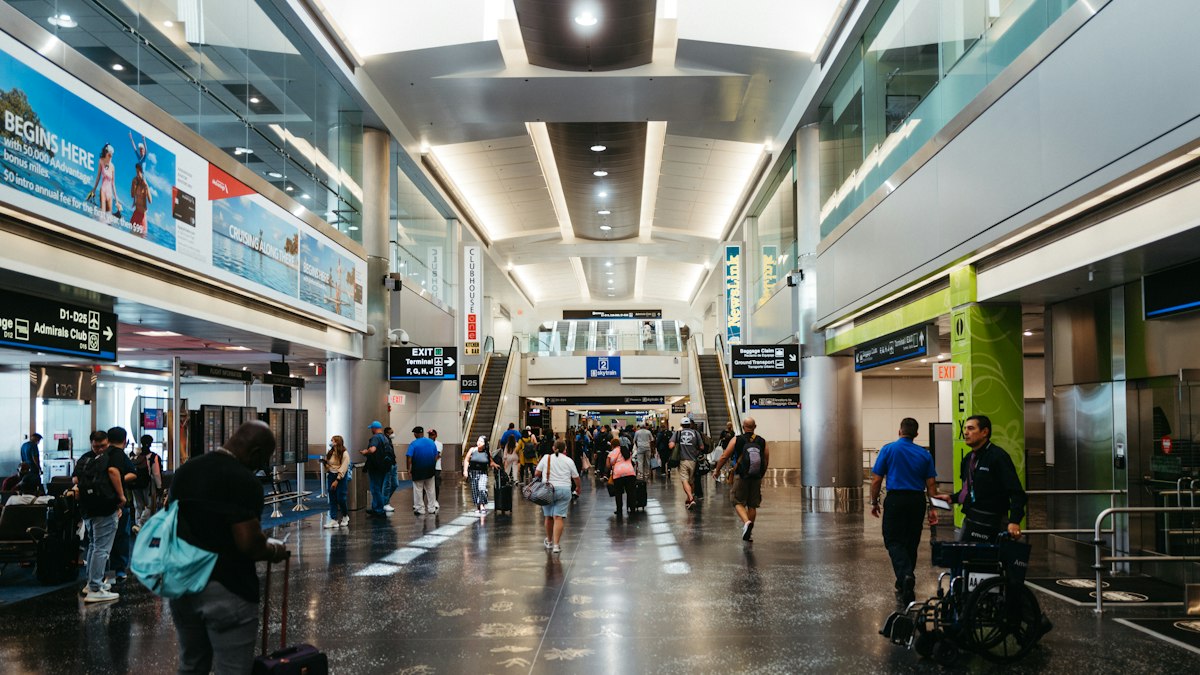 Families arriving at a modern airport