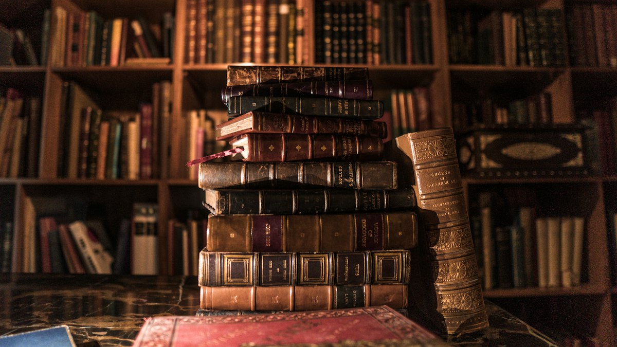Old books on library shelves