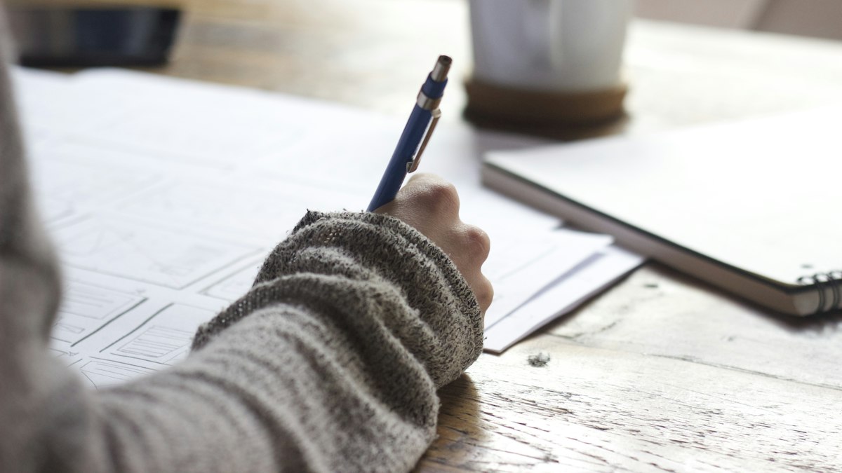 A student writing an English test