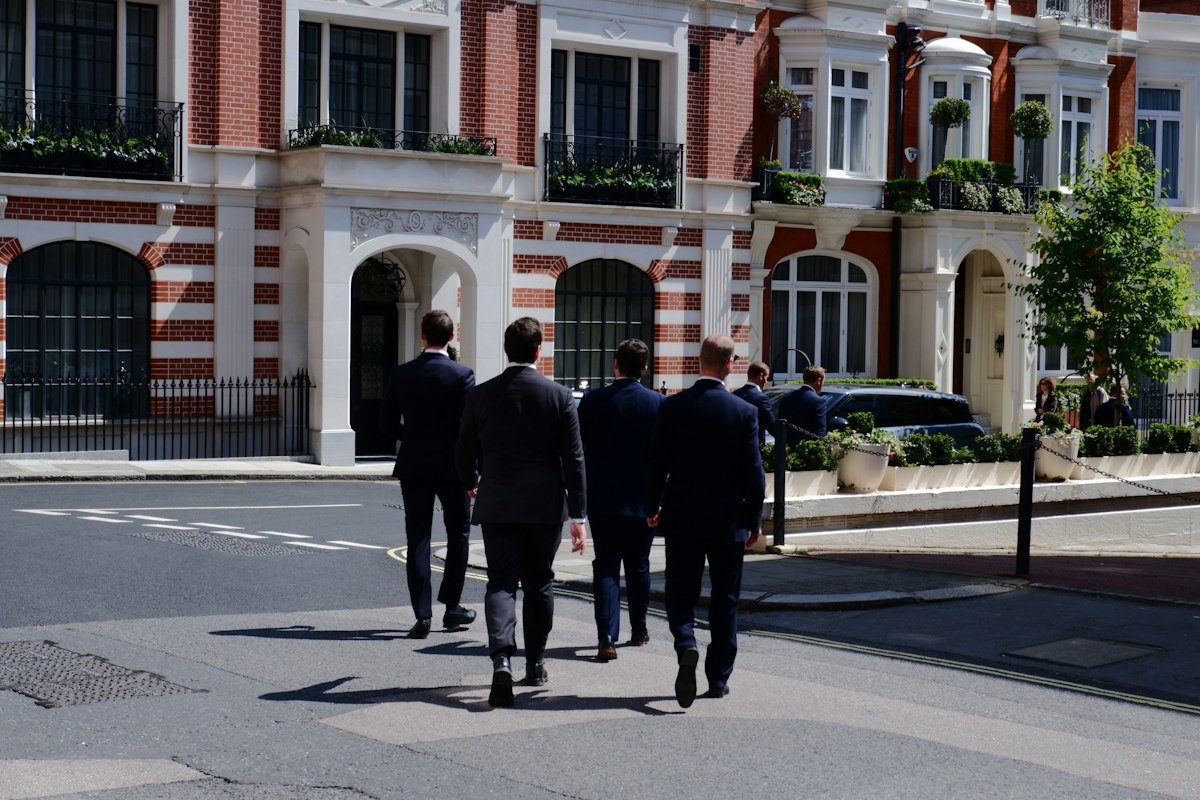 People walking along a street in a UK city