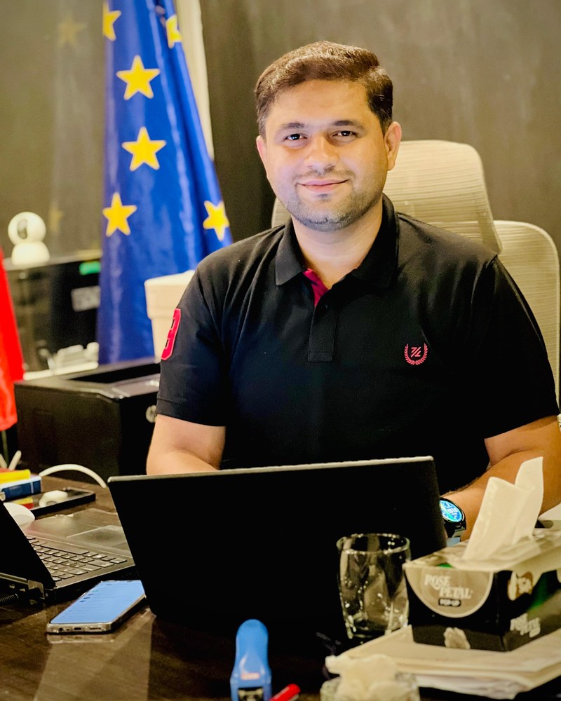 Asad Dogar, Senior Consultant and Program Manager at Westside Visa Consultants, at his desk in our DHA Lahore office