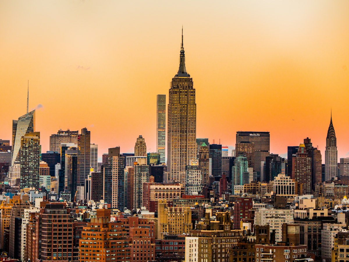 The Empire State Building and Manhattan skyline at sunset